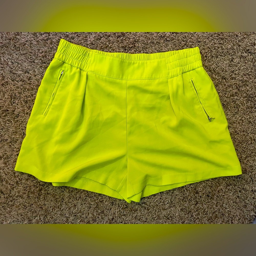 Jennifer Lopez Neon dress shorts.